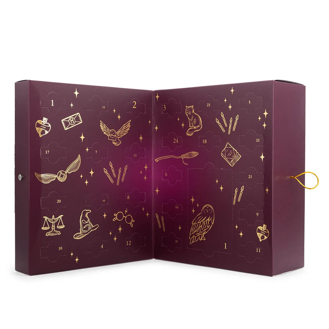 Harry Potter Advent Calendar in a premium purple and gold box featuring Hogwarts and magical icons. Includes 24 pieces of scented wax melts and one wax warmer.
