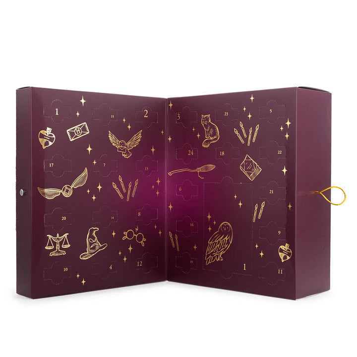 Harry Potter Advent Calendar in a premium purple and gold box featuring Hogwarts and magical icons. Includes 24 pieces of scented wax melts and one wax warmer.
