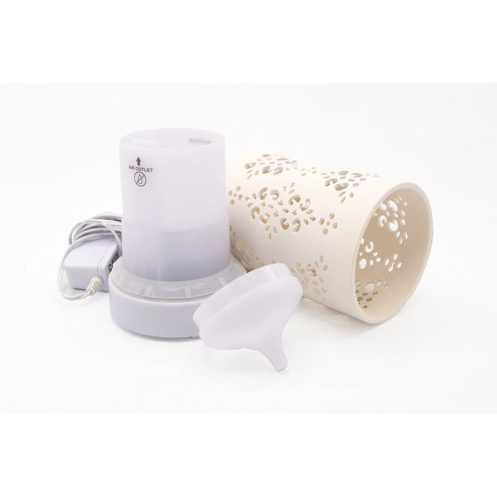 Elegant keramic electric diffuser with white design. 