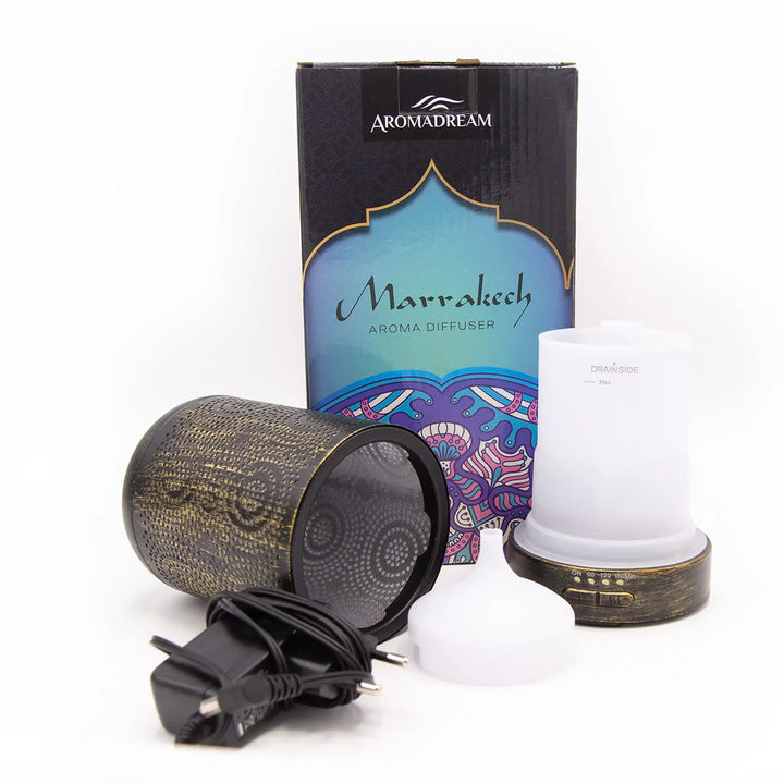 Electric Diffuser with decorative circular pattern and bronze metallic finish