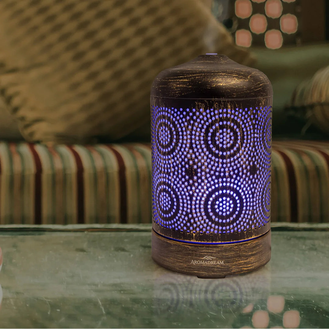 Electric Diffuser with decorative circular pattern and bronze metallic finish