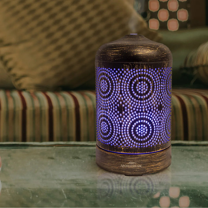 Electric Diffuser with decorative circular pattern and bronze metallic finish