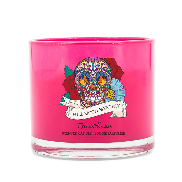 Frida Kahlo Full Moon Mystery scented candle. Vibrant pink glass candle featuring a colorful sugar skull and floral design inspired by Frida Kahlo’s iconic art style.