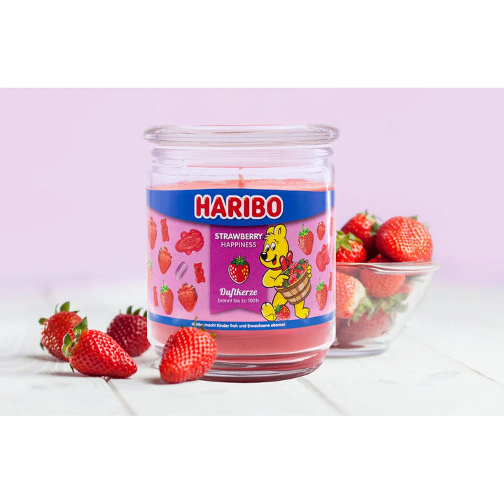 HARIBO Strawberry Happiness scented candle – red jar candle decorated with strawberries and the cheerful HARIBO bear design.