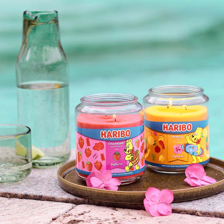 HARIBO Strawberry Happiness scented candle – red jar candle decorated with strawberries and the cheerful HARIBO bear design.