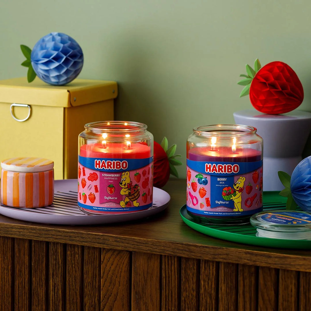HARIBO Strawberry Happiness scented candle – red jar candle decorated with strawberries and the cheerful HARIBO bear design.