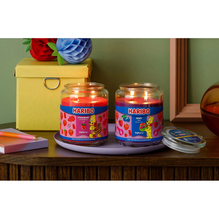 HARIBO Strawberry Happiness scented candle – red jar candle decorated with strawberries and the cheerful HARIBO bear design.