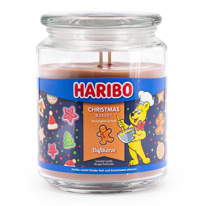 Haribo Christmas Bakery scented candle σε γυάλινο βάζο με εικονογράφηση μπισκότων και τον Haribo αρκούδο, ιδανικό χριστουγεννιάτικο δώρο με άρωμα γιορτινής ζαχαροπλαστικής.