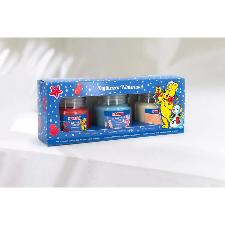 HARIBO Winterland scented candle set – gift box with three scented candles: Winter Cherry, Fluffy Clouds, and Vanilla Whipped Cream, featuring festive packaging and the classic HARIBO bear design.