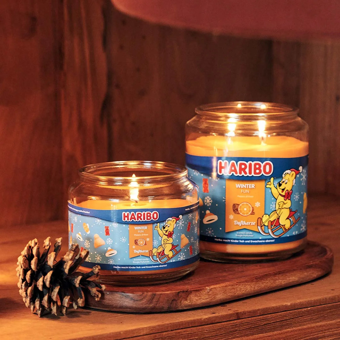 HARIBO Winter Fun scented candle – orange jar candle decorated with festive theme and the cheerful HARIBO bear.