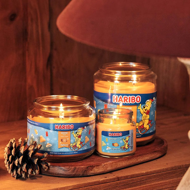 HARIBO Winter Fun scented candle – orange jar candle decorated with festive theme and the cheerful HARIBO bear.