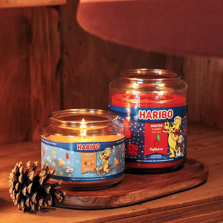 HARIBO Winter Fun scented candle – orange jar candle decorated with festive theme and the cheerful HARIBO bear.