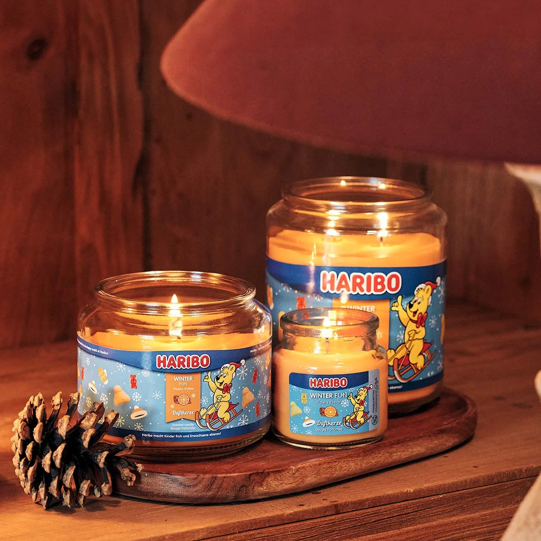 HARIBO Winter Fun scented candle – orange jar candle decorated with festive theme and the cheerful HARIBO bear.
