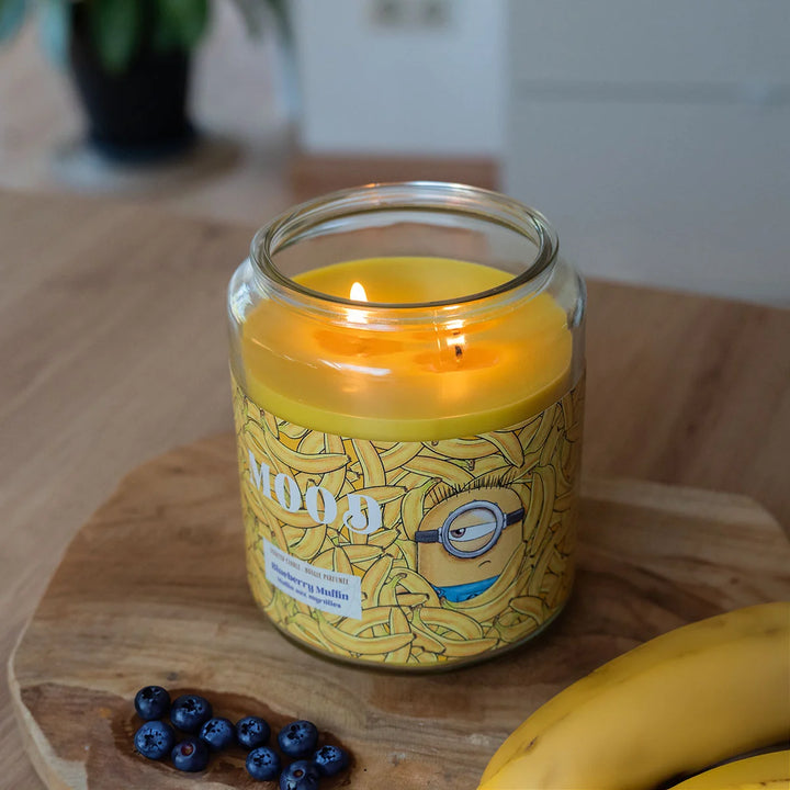 Minions Mood Blueberry Muffin Scented Candle in glass jar with wooden lid and banana design label
