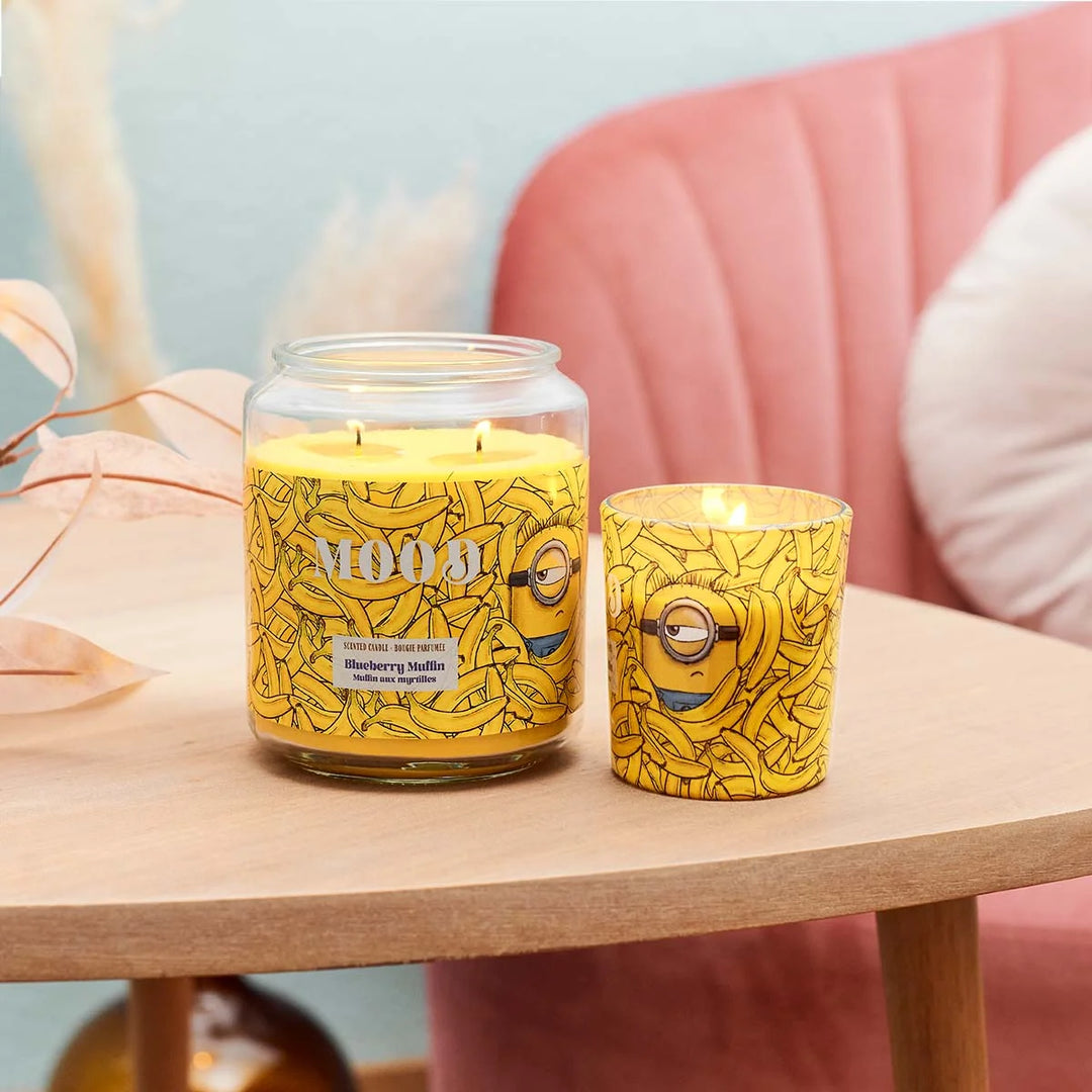 Minions Mood Blueberry Muffin Scented Candle in glass jar with wooden lid and banana design label