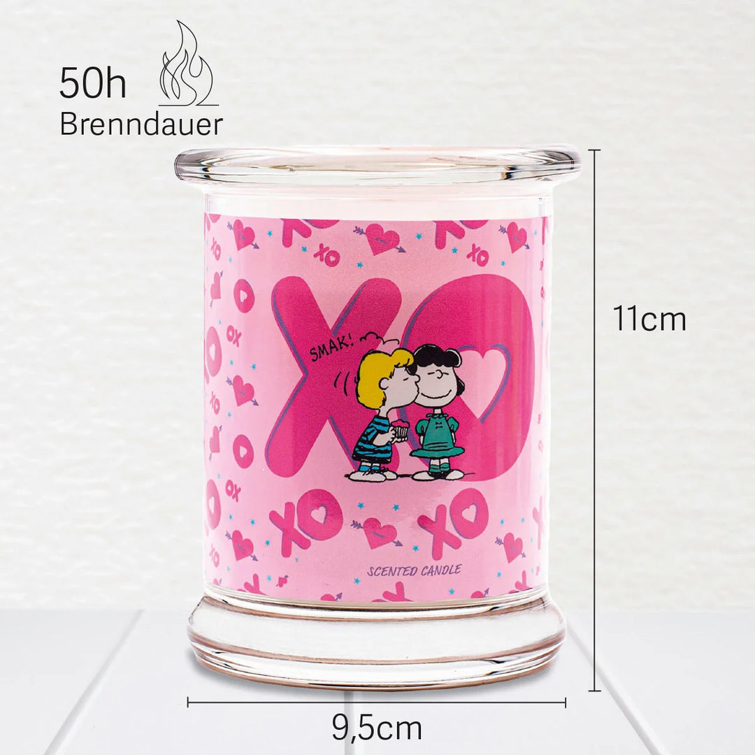 Peanuts XOXO Scented Candle  in glass jar with cotton wick and pink design label 