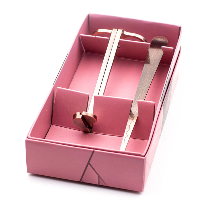 Copper wick trimmer & wick dipper in their packaging